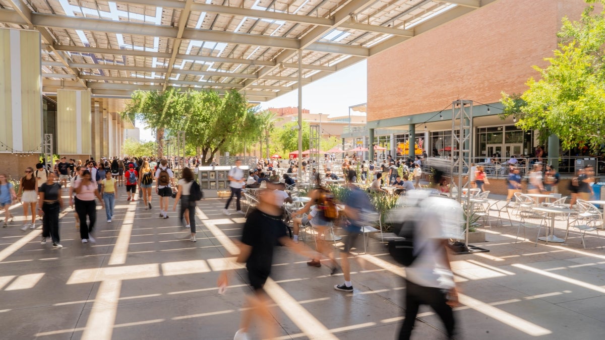 Timelapse photo of students walking on the plaza outside of ASU Memorial Union on the first day of classes in Fall 2024